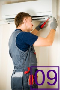man repair air-conditioner